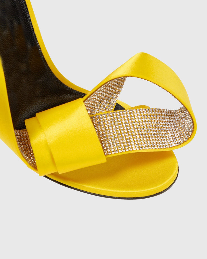 Crocifissa Spiral Rhinestone Bow Strap Sandals In Yellow