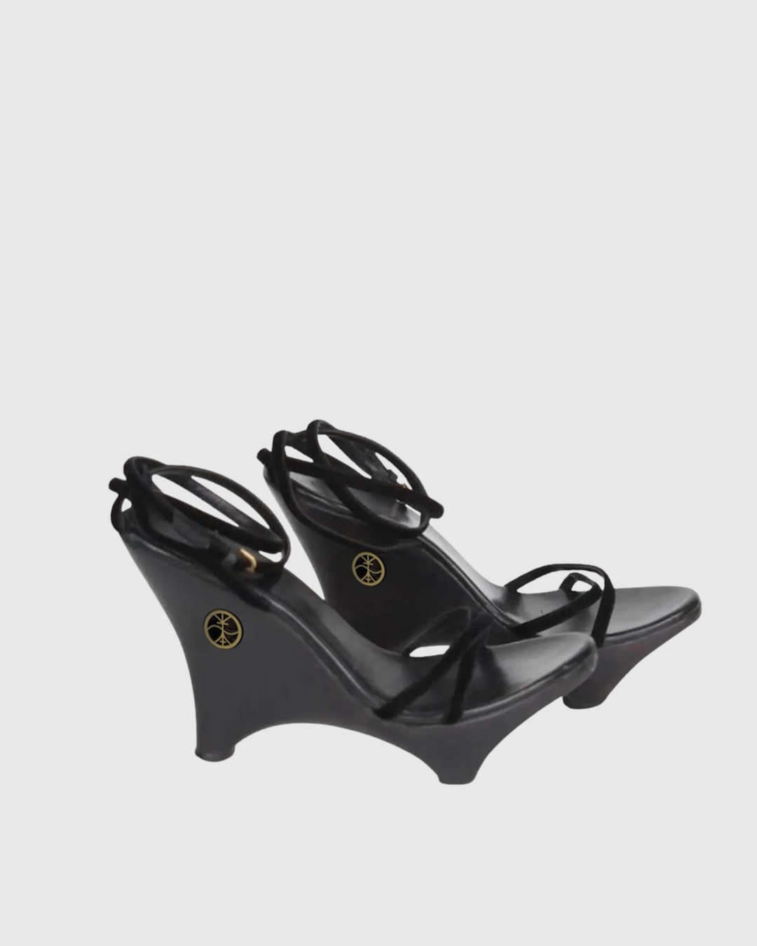 Daryl Sculptural Wedge Heels In Black